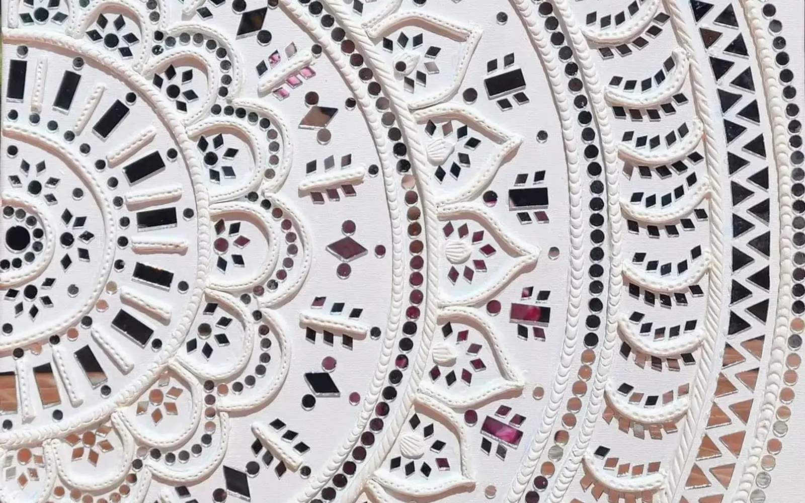 A Lipan art mandala with mirror work, made by hand